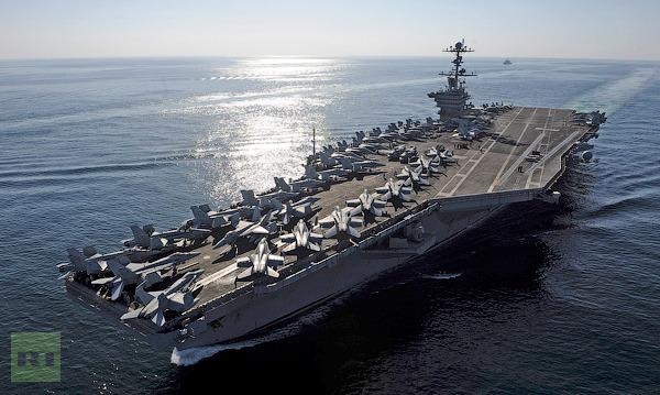 The aircraft carrier USS John C. Stennis transits the Straits of Hormuz in this U.S. Navy handout photo dated November 12, 2011 (Reuters/U.S. Navy/Mass Communication Specialist 3rd Class Kenneth Abbate/Handout)